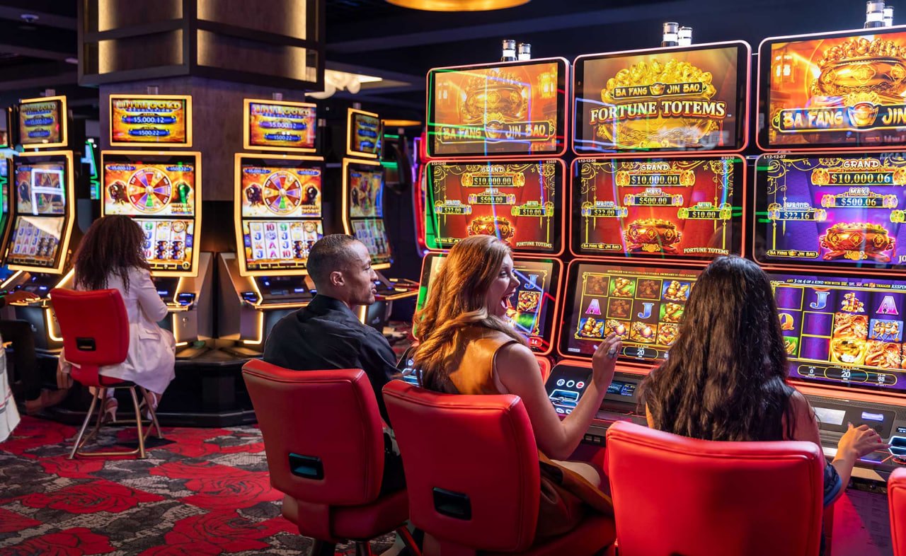 Live dealer at Lightning Baccarat table with cards and betting layout